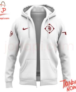 Make every step count with 2 Coach Patty Gasso Oklahoma Sooners Zip Hoodie.